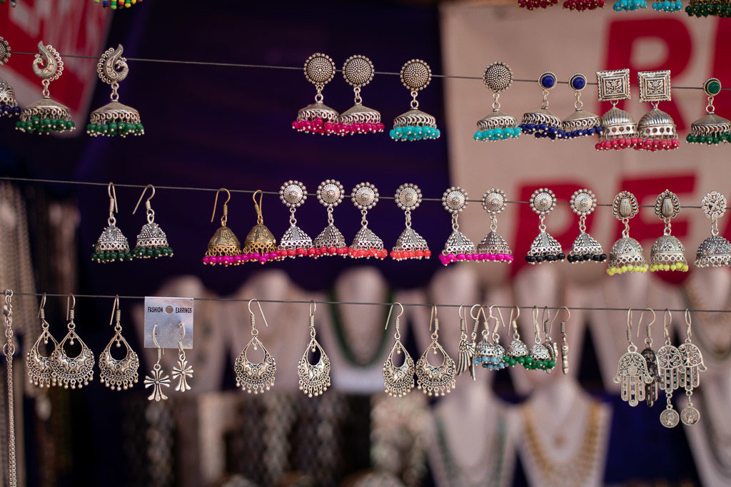 Indian style earrings on display - you will want to learn how to haggle to get a great price on these.