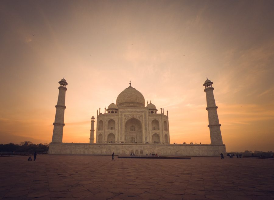 Taj Mahal at sunset appears golden due to the reflective nature of the marble.